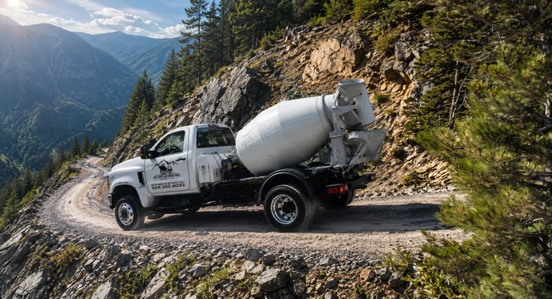 Mountain Mini-Mix concrete truck on a winding mountain road